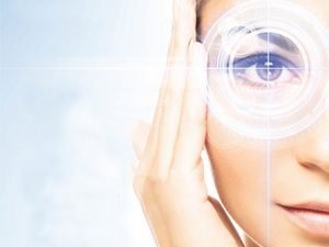 Image of an eye with a laser target over it