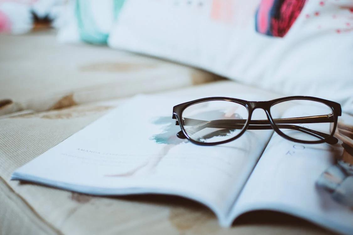 glasses on book